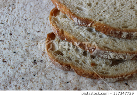 Thinly sliced homemade bread on the surface of yeast free lavash with grains 137347729