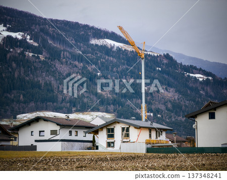Idyllic Rural Community Situated Beside Majestic Snowy Summits And Lush Fields Idyllic Rural Community Situated Beside Majestic Snowy Summits And Lush Fields 137348241