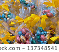 Colorful easter chocolate eggs in festive gift packaging. 137348541