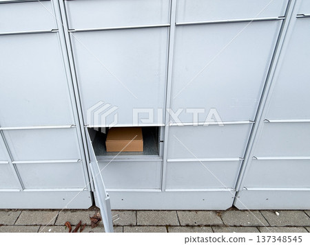 Package delivery in residential parcel locker box. Package delivery in residential parcel locker box. 137348545
