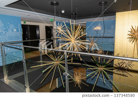 Decorative hanging lights in modern hotel lobby interior  137348580