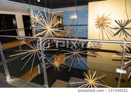 Decorative hanging lights in modern hotel lobby interior  137348581