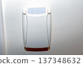 Hotel key card holder on wall, energy saving switch in room interior. 137348632