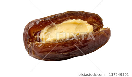 Fresh, pitted date fruit elegantly stuffed with a smooth, creamy filling isolated on transparent background Fresh, pitted date fruit elegantly stuffed with a smooth, creamy filling isolated on transparent background 137349391