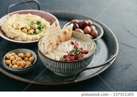 Middle eastern, arabic traditional breakfast with hummus, falafel, mutabbal, Middle eastern, arabic traditional breakfast with hummus, falafel, mutabbal, 137351305