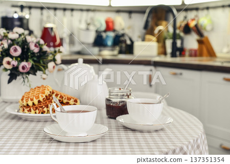 breakfast with tea and a homemade Belgian waffles 137351354