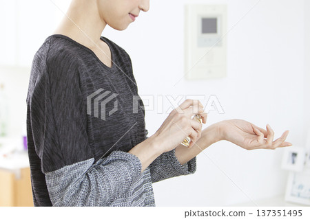 Women wearing perfume 137351495