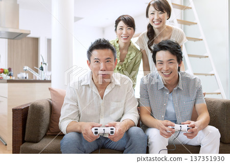 Two-generation family playing games Two-generation family playing games 137351930