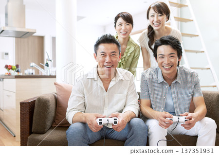Two-generation family playing games 137351931