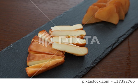 Smoked cheese and smoked daikon radish Smoked cheese and smoked daikon radish 137352760