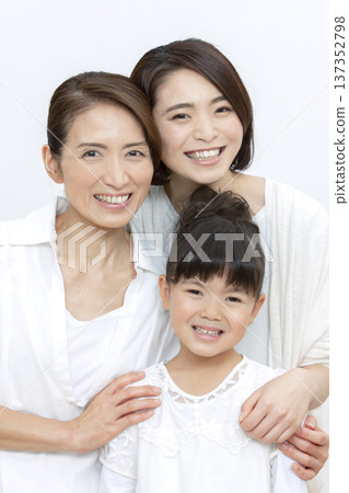 Smiling three-generation family portrait Smiling three-generation family portrait 137352798