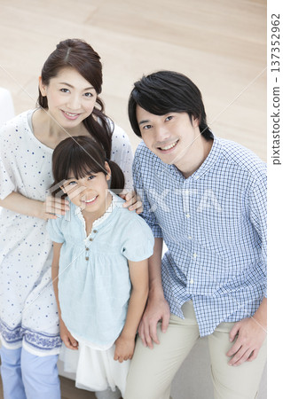 Family sitting on the sofa Family sitting on the sofa 137352962