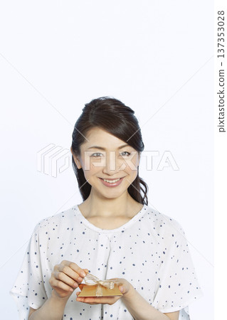 A woman with a present A woman with a present 137353028