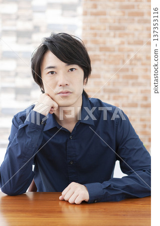 A man thinking A man thinking 137353116