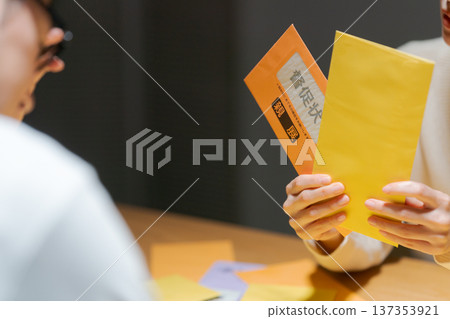 A couple struggling with a lot of bills A couple struggling with a lot of bills 137353921