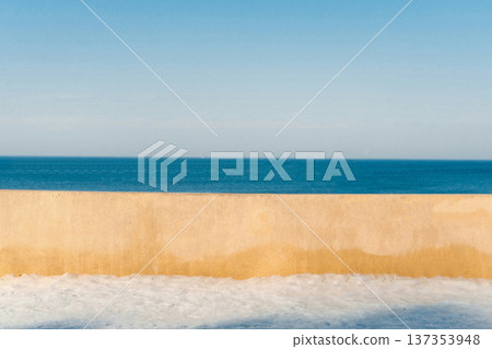 Minimalist Seascape with Blue Ocean Horizon, Sandy Beach Texture and Clear Sky Background 137353948