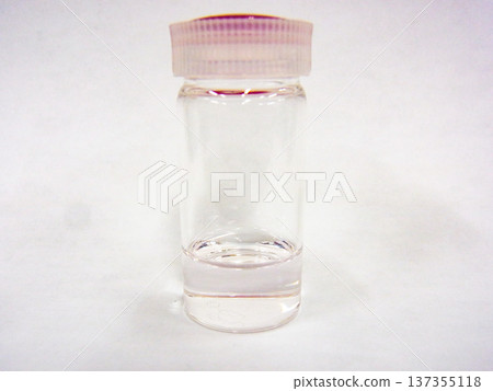 Clear glass bottle and its clean background 137355118