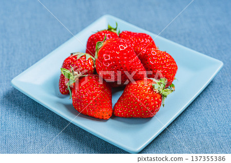 Assortment of fresh strawberries, red ripe seasonal fruits 137355386