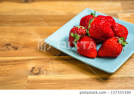 Assortment of fresh strawberries, red ripe seasonal fruits Assortment of fresh strawberries, red ripe seasonal fruits 137355390