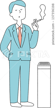 一名年輕的男性上班族在吸菸區抽煙。 一名年輕的男性上班族在吸菸區抽煙。 137356108