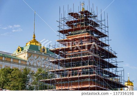 Moscow Kremlin tower under restoration with scaffolding protecting historic architecture Moscow Kremlin tower under restoration with scaffolding protecting historic architecture 137356198