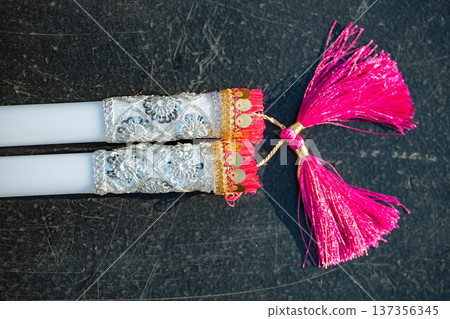 Traditional Indian decorative tassels with sequins and embroidery for cultural celebration Traditional Indian decorative tassels with sequins and embroidery for cultural celebration 137356345
