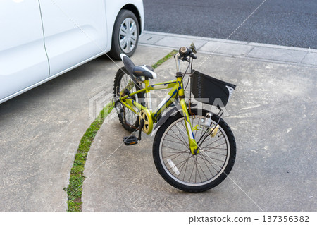 Park your child's bike in the garden 137356382