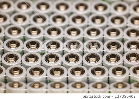 Rows of electric batteries providing power for energy storage and sustainability Rows of electric batteries providing power for energy storage and sustainability 137356402