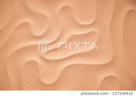 Abstract peach background with soft wavy pattern and creamy undulating texture Abstract peach background with soft wavy pattern and creamy undulating texture 137356418