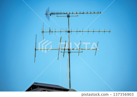 Television antenna with multiple elements receiving digital broadcasts on a clear sky 137356903