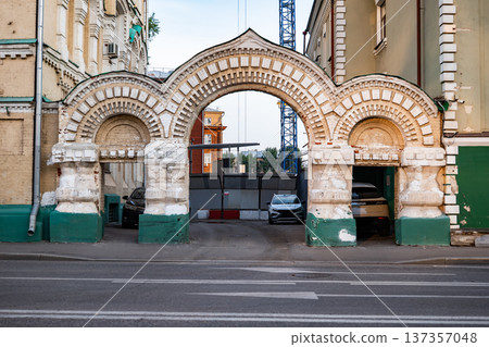 Historic ornate archway in Moscow street, old city architecture and urban decay 137357048