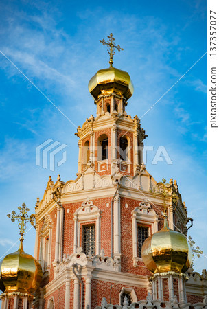 Church of the Intercession in Fili tower with golden onion domes and crosses Church of the Intercession in Fili tower with golden onion domes and crosses 137357077