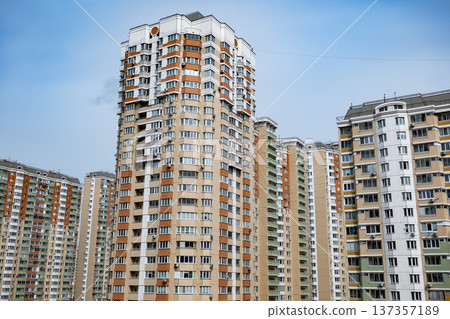 Urban residential high-rise buildings reaching into a clear sky Urban residential high-rise buildings reaching into a clear sky 137357189
