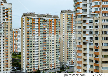 Modern residential towers presenting urban living and high-rise architecture Modern residential towers presenting urban living and high-rise architecture 137357218