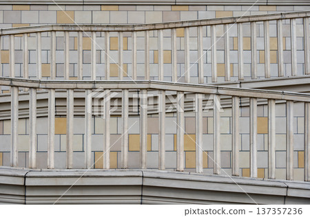 Repeating geometric pattern with railings on modern building facade design Repeating geometric pattern with railings on modern building facade design 137357236