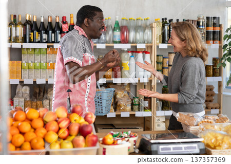 Family quarrel between husband and wife while shopping in grocery supermarket 137357369