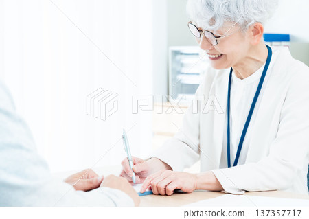 Senior woman receiving consultation Senior woman receiving consultation 137357717
