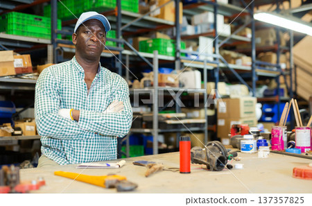 African-American man worker posing at workplace 137357825