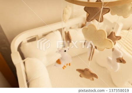 Soft clouds and stars dangle above a peaceful sleeping space 137358019