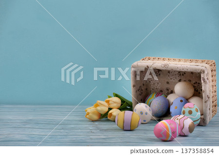Easter Eggs and Tulips. Festive spring arrangement with colorful eggs and flowers. Easter Eggs and Tulips. Festive spring arrangement with colorful eggs and flowers. 137358854