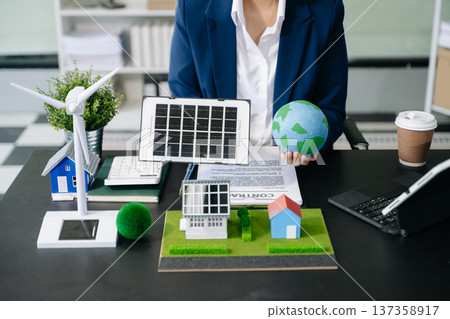 Business people planning hand using laptop for working technology and business Net zero and carbon neutral Business people planning hand using laptop for working technology and business Net zero and carbon neutral 137358917