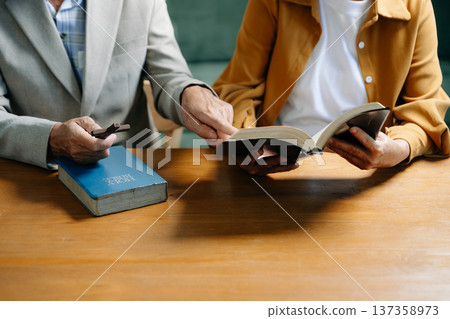 Christians are congregants join hands to pray and seek the blessings 137358973