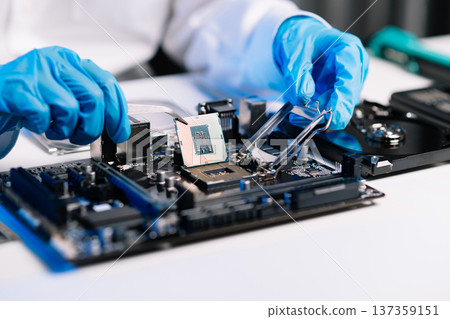 The technician repairing the motherboard in the lab with copy space. the concept of computer hardware, mobile phone, electronic, repairing, upgrade 137359151