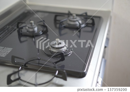 Gas stove (3 burners, freestanding type) with the trivet removed 137359200