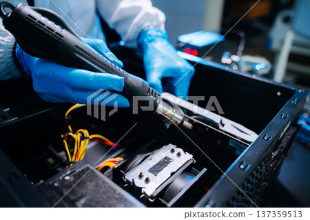 Technician installing graphics card inside desktop PC. Computer hardware upgrade, motherboard wiring, IT repair service and technology Technician installing graphics card inside desktop PC. Computer hardware upgrade, motherboard wiring, IT repair service and technology 137359513