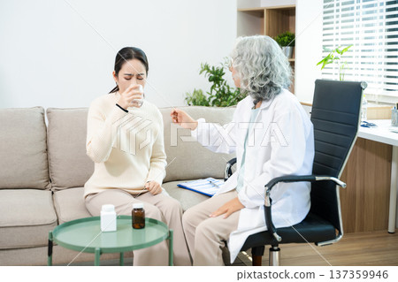 Psychiatrist comforting stressed patient during mental health therapy. Psychology counseling, emotional support, depression and anxiety treatment Psychiatrist comforting stressed patient during mental health therapy. Psychology counseling, emotional support, depression and anxiety treatment 137359946