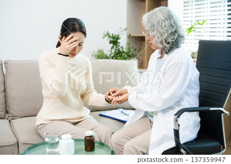 Psychiatrist comforting stressed patient during mental health therapy. Psychology counseling, emotional support, depression and anxiety treatment Psychiatrist comforting stressed patient during mental health therapy. Psychology counseling, emotional support, depression and anxiety treatment 137359947
