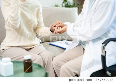 Psychiatrist comforting stressed patient during mental health therapy. Psychology counseling, emotional support, depression and anxiety treatment Psychiatrist comforting stressed patient during mental health therapy. Psychology counseling, emotional support, depression and anxiety treatment 137359948