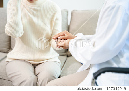 Psychiatrist comforting stressed patient during mental health therapy. Psychology counseling, emotional support, depression and anxiety treatment Psychiatrist comforting stressed patient during mental health therapy. Psychology counseling, emotional support, depression and anxiety treatment 137359949