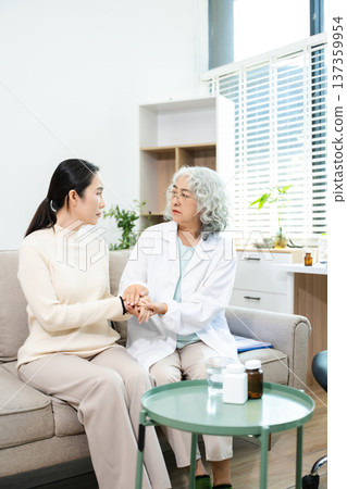 Psychiatrist comforting stressed patient during mental health therapy. Psychology counseling, emotional support, depression and anxiety treatment Psychiatrist comforting stressed patient during mental health therapy. Psychology counseling, emotional support, depression and anxiety treatment 137359954